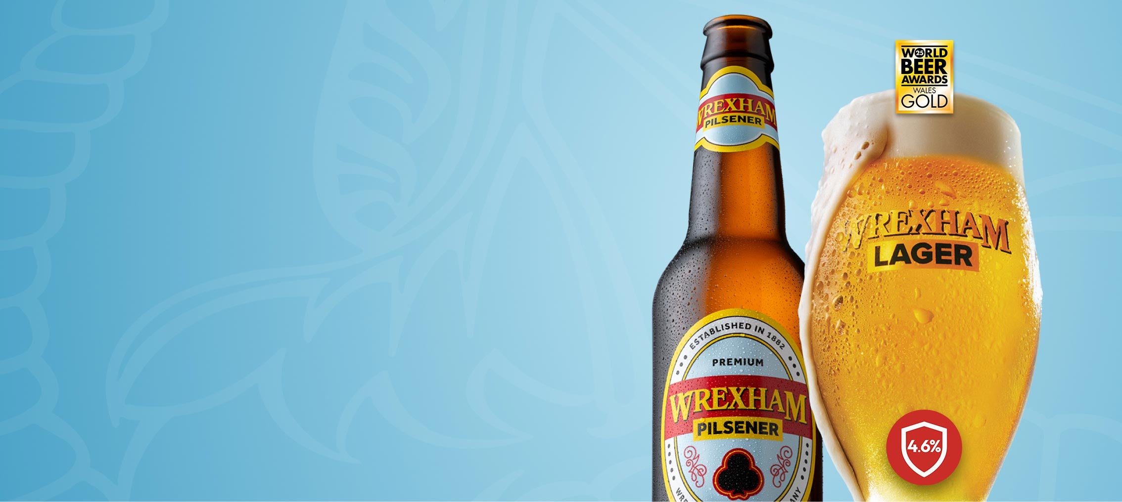 Wrexham Pilsener bottle and pint on a blue background